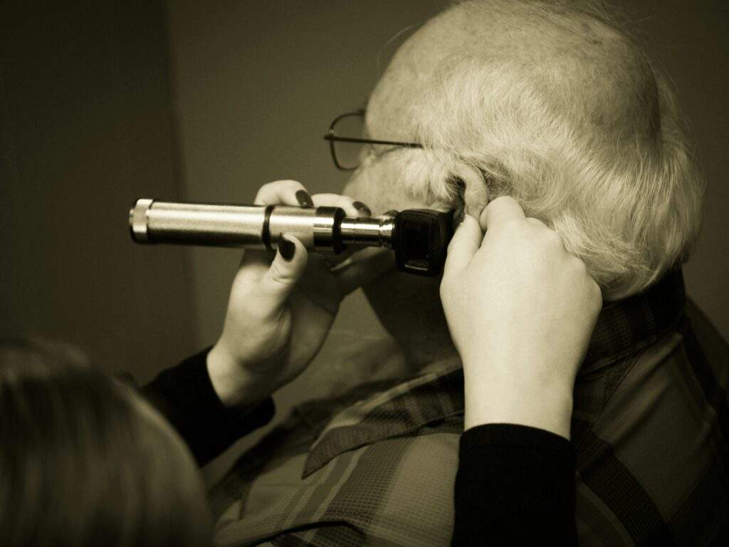 A man doing an audiogram test for hearing loss stages