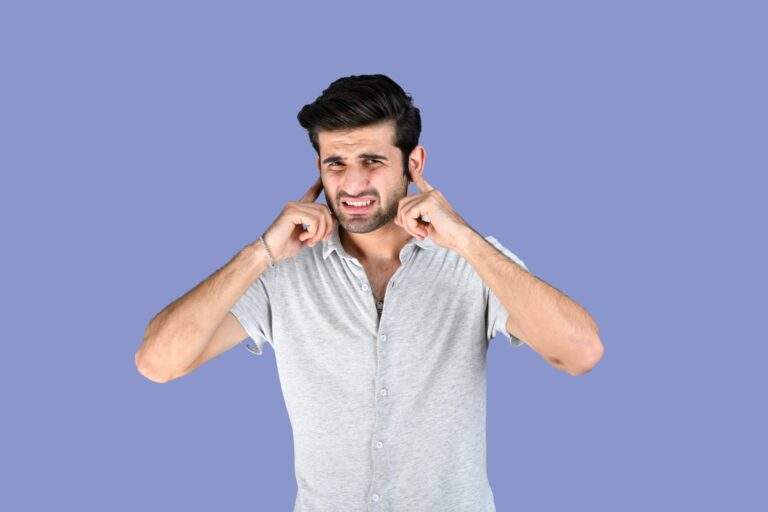 man showing signs of hearing loss